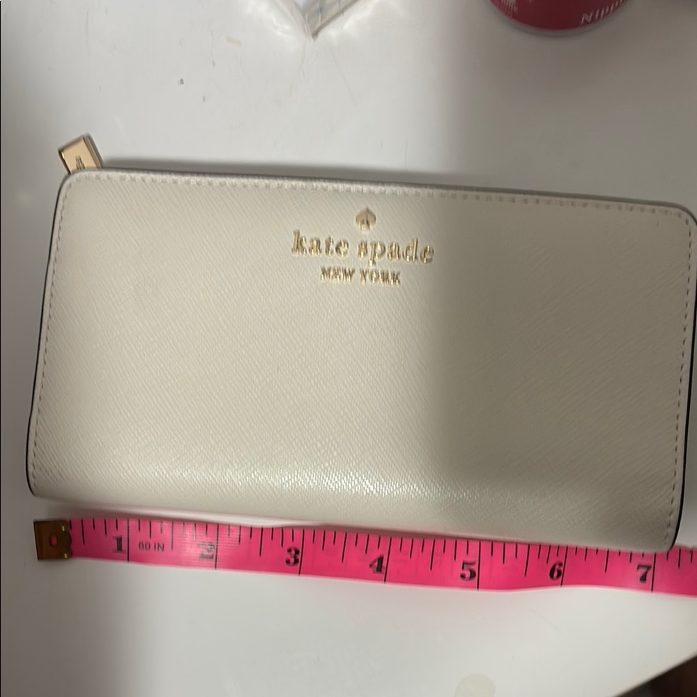 Kate Spade Cream Leather Wallet with Gold Accents